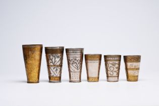 Six engraved brass and pewter cups for lassi, India, first half 20th C.