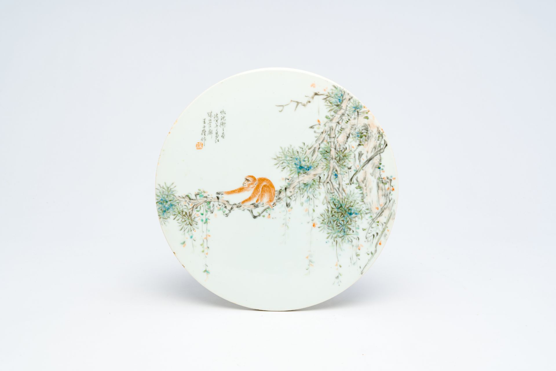 A round Chinese qianjiang cai 'monkey on a branch' plaque, 19th/20th C.