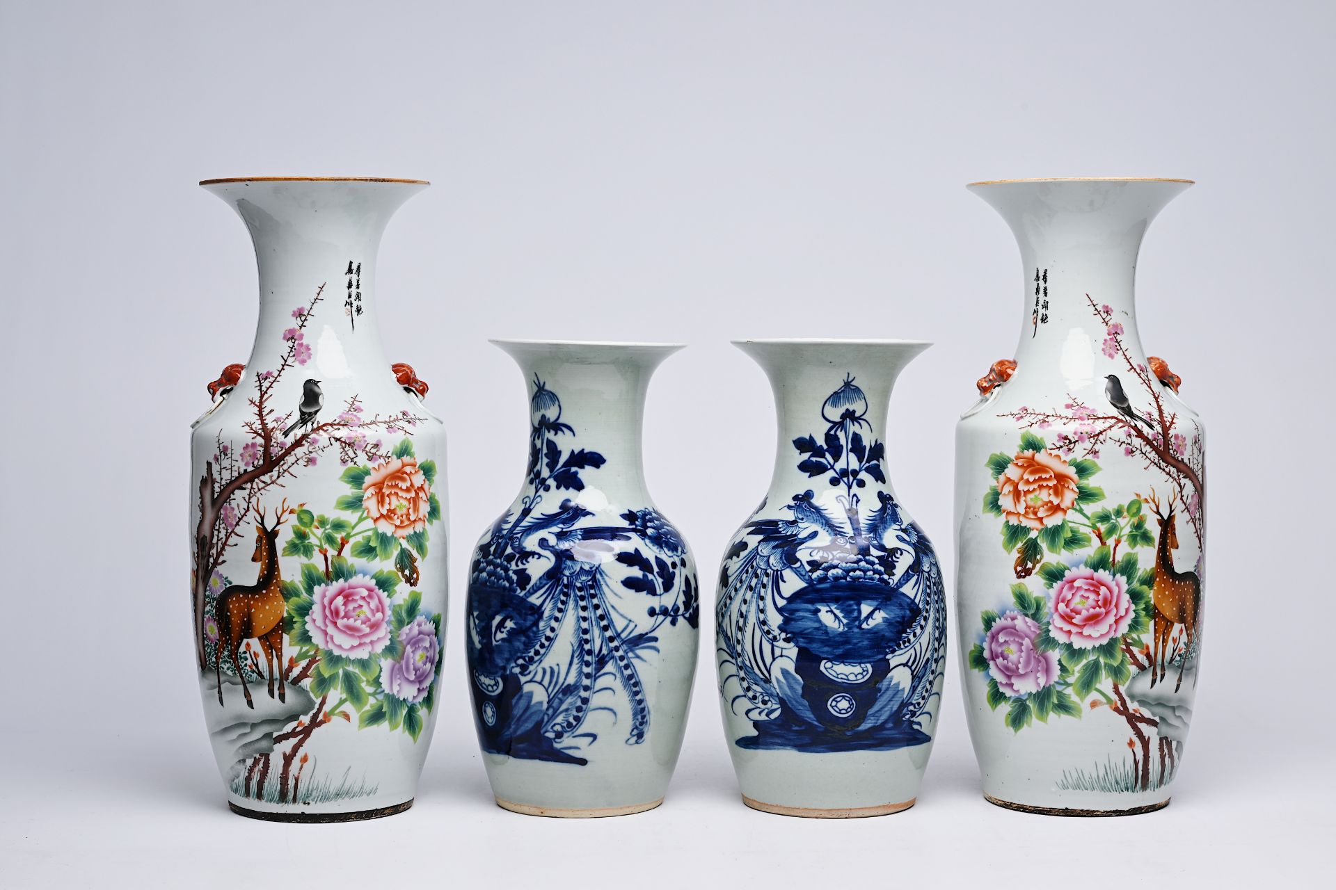 A pair of Chinese famille rose 'deer' vases and a pair of blue and white celadon ground 'phoenixes'