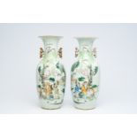 A pair of Chinese qianjiang cai vases with an animated landscape, 19th/20th C.