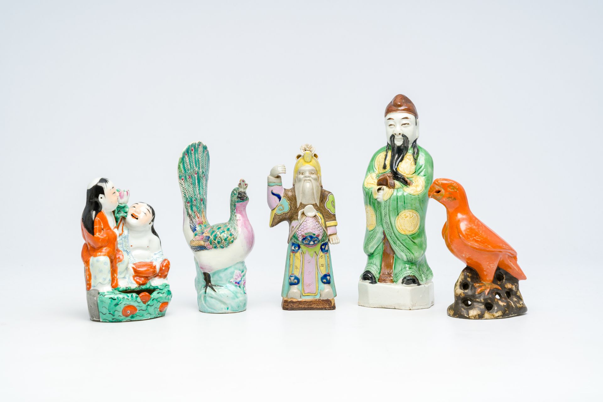 Five various Chinese famille rose and polychrome porcelain figures, 19th/20th C.