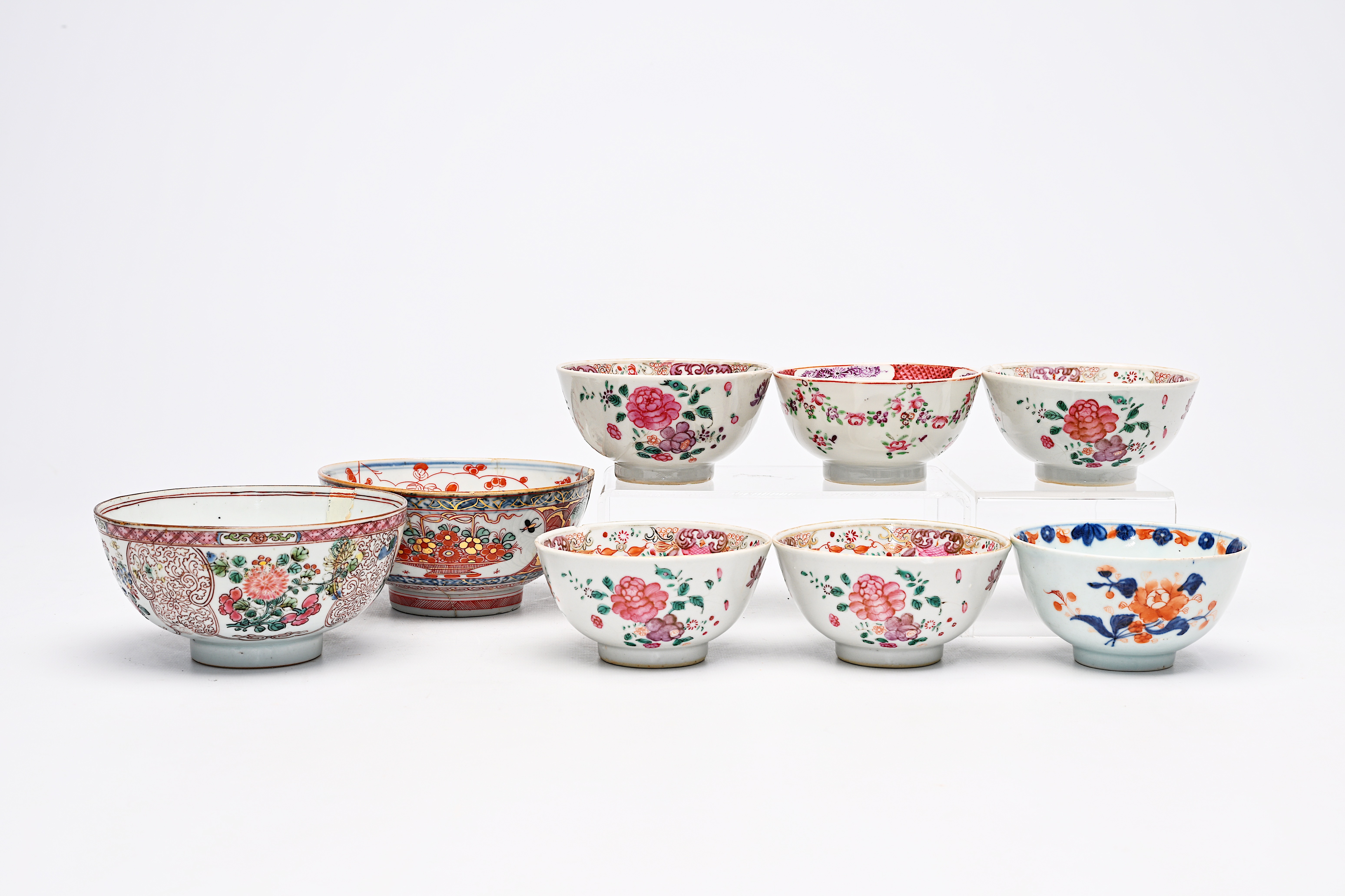 Eight Chinese famille rose, Imari style and Amsterdams bont cups and bowls, Yongzheng/Qianlong