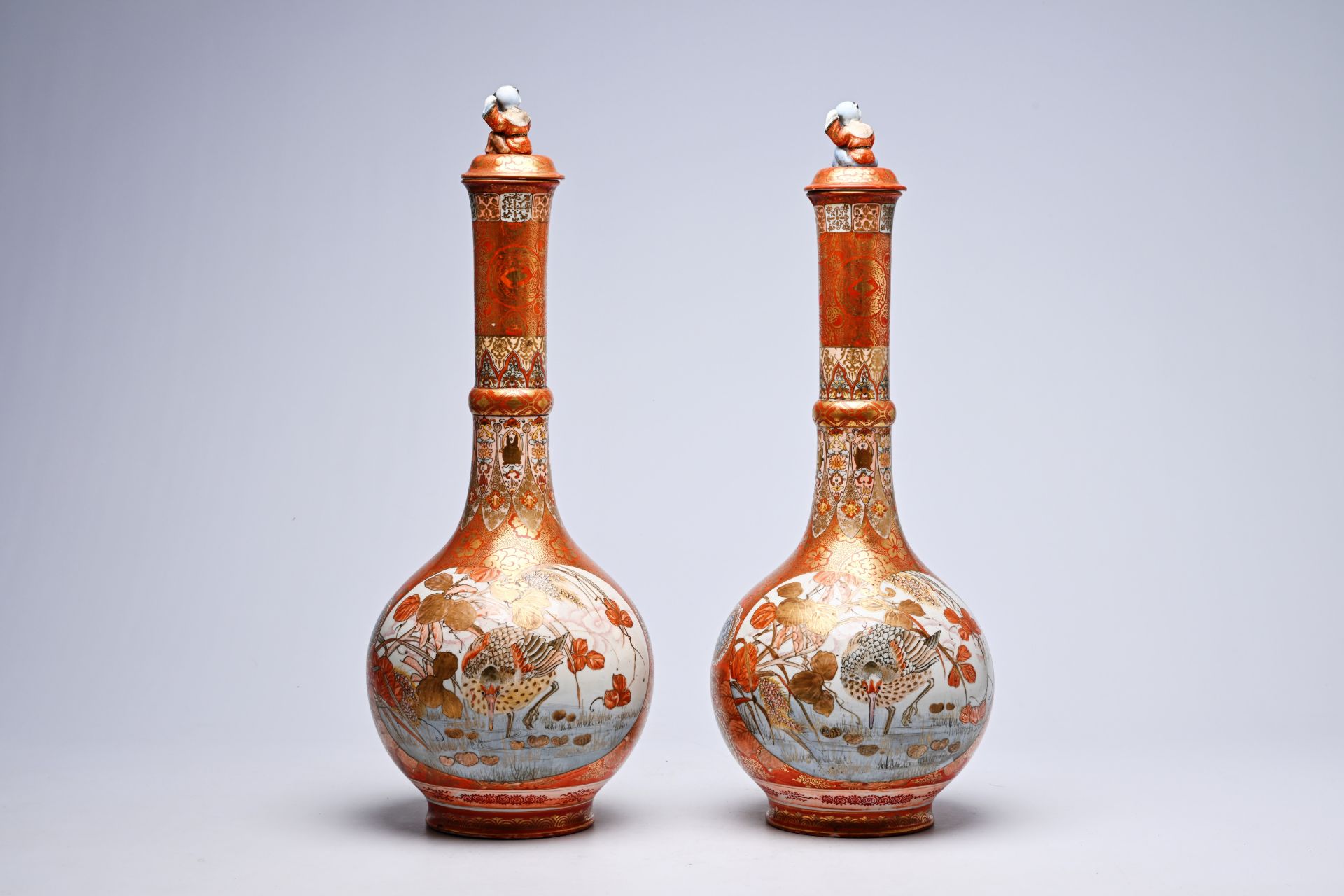 A pair of Japanese Kutani bottle-shaped vases and covers with a coot among blossoming branches and f - Image 3 of 11