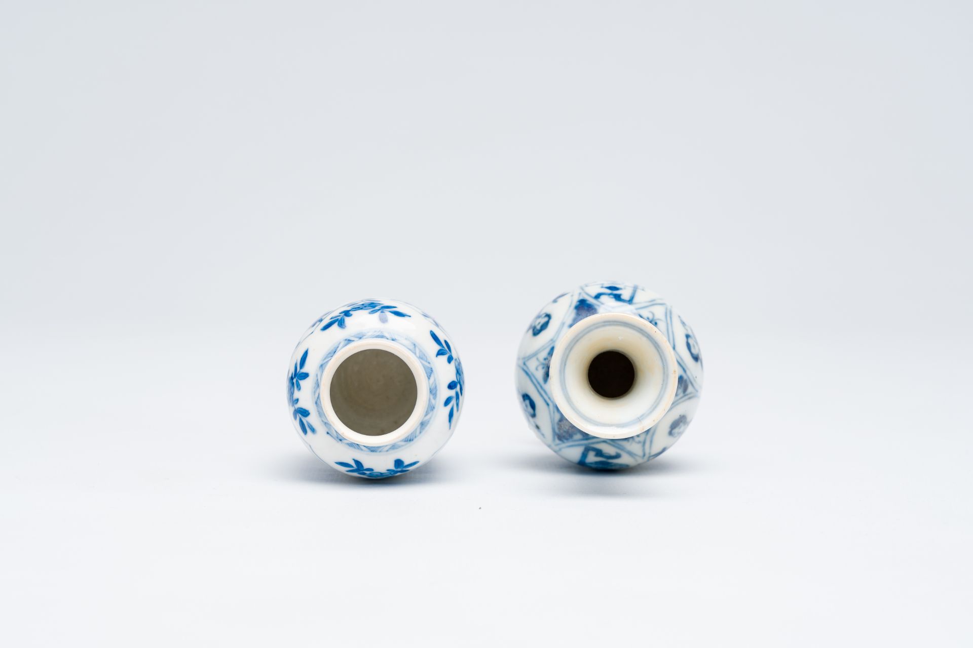 A Chinese blue and white soft paste vase with floral design and a 'ladies and birdcages' vase, Kangx - Image 5 of 6