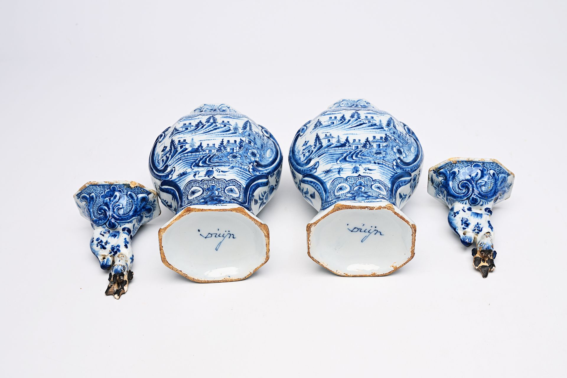A pair of Dutch Delft blue and white vases and covers with landscapes and four various plates, 18th/ - Image 11 of 13