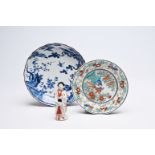 A Japanese blue and white and a Kakiemon plate with birds in a landscape and a 'bijin' figure, Edo/M