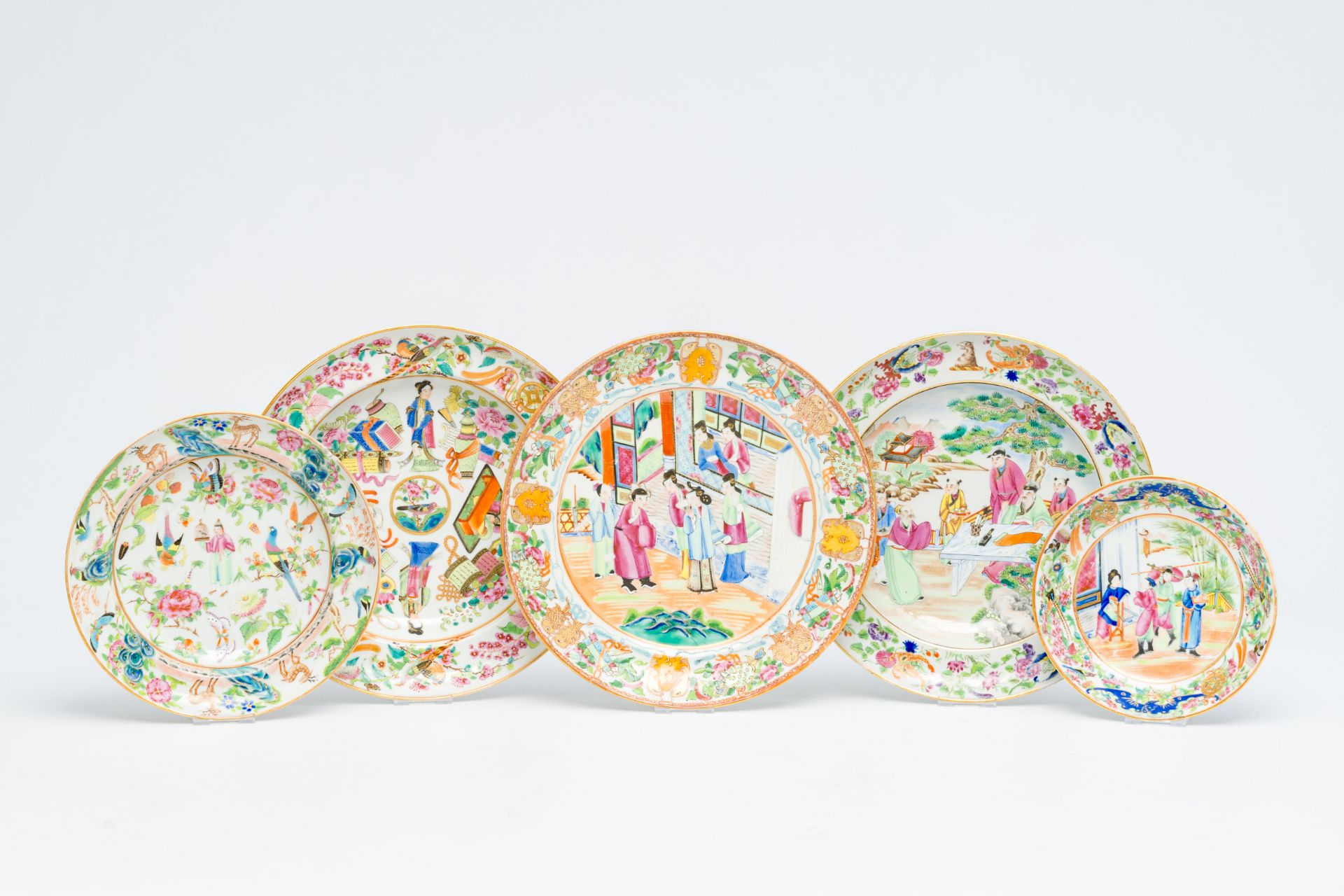 Five Chinese Canton famille rose plates with palace scenes and figurative design, 19th C.