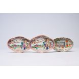 Three Chinese famille rose 'mandarin subject' spoon trays, 18th/19th C.