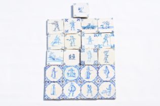 Twenty-one Dutch Delft blue and white 'figure' tiles, 17th/18th C.