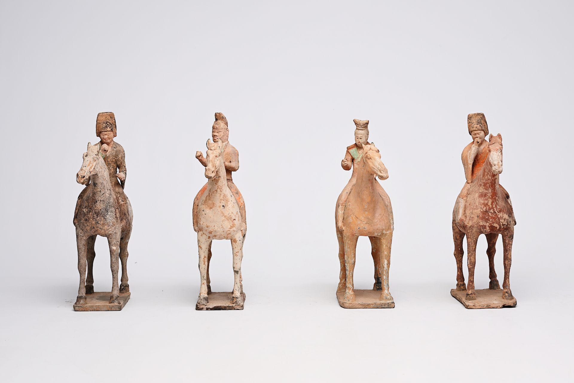 Four Chinese polychrome painted pottery equestrian figures, Tang - Image 20 of 22