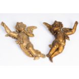 A pair of carved and gilt wood angels, 18th C.