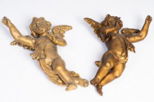 A pair of carved and gilt wood angels, 18th C.