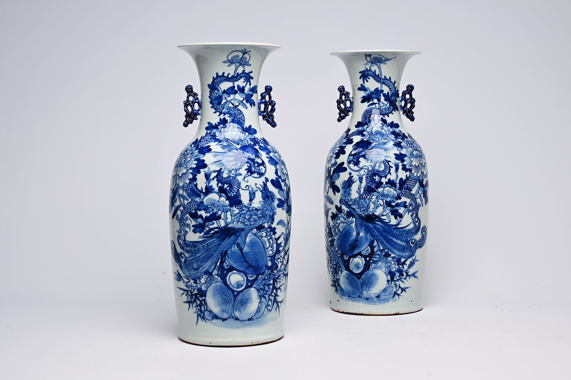 A pair of Chinese blue and white celadon ground vases with a dragon and a phoenix among blossoming b - Bild 21 aus 28