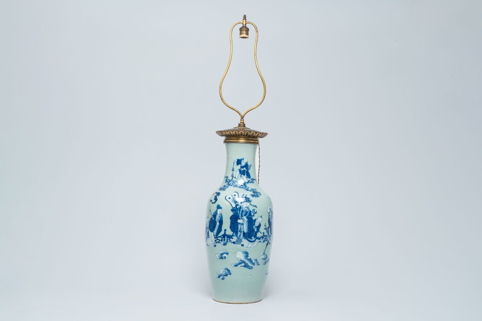 A Chinese blue and white celadon ground vase with the 'Star God' figures and their servants mounted