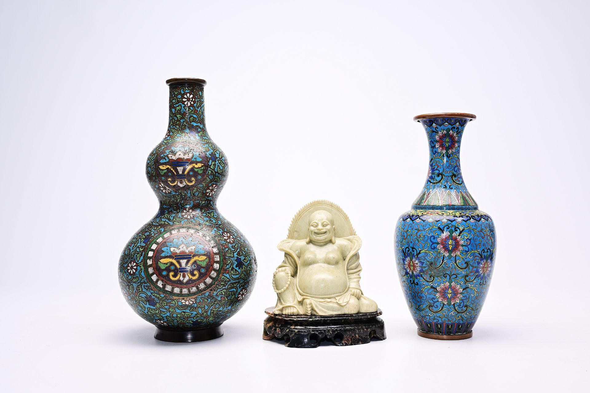Two cloisonne and champleve vases and a soapstone figure of Buddha, China and Japan, 19th/20th C.