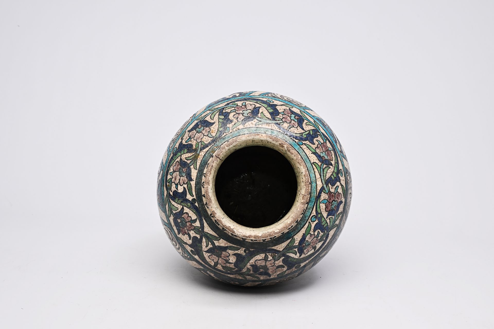 A polychrome pottery jar with floral and calligraphic design, Iran, 19th C. - Image 7 of 9