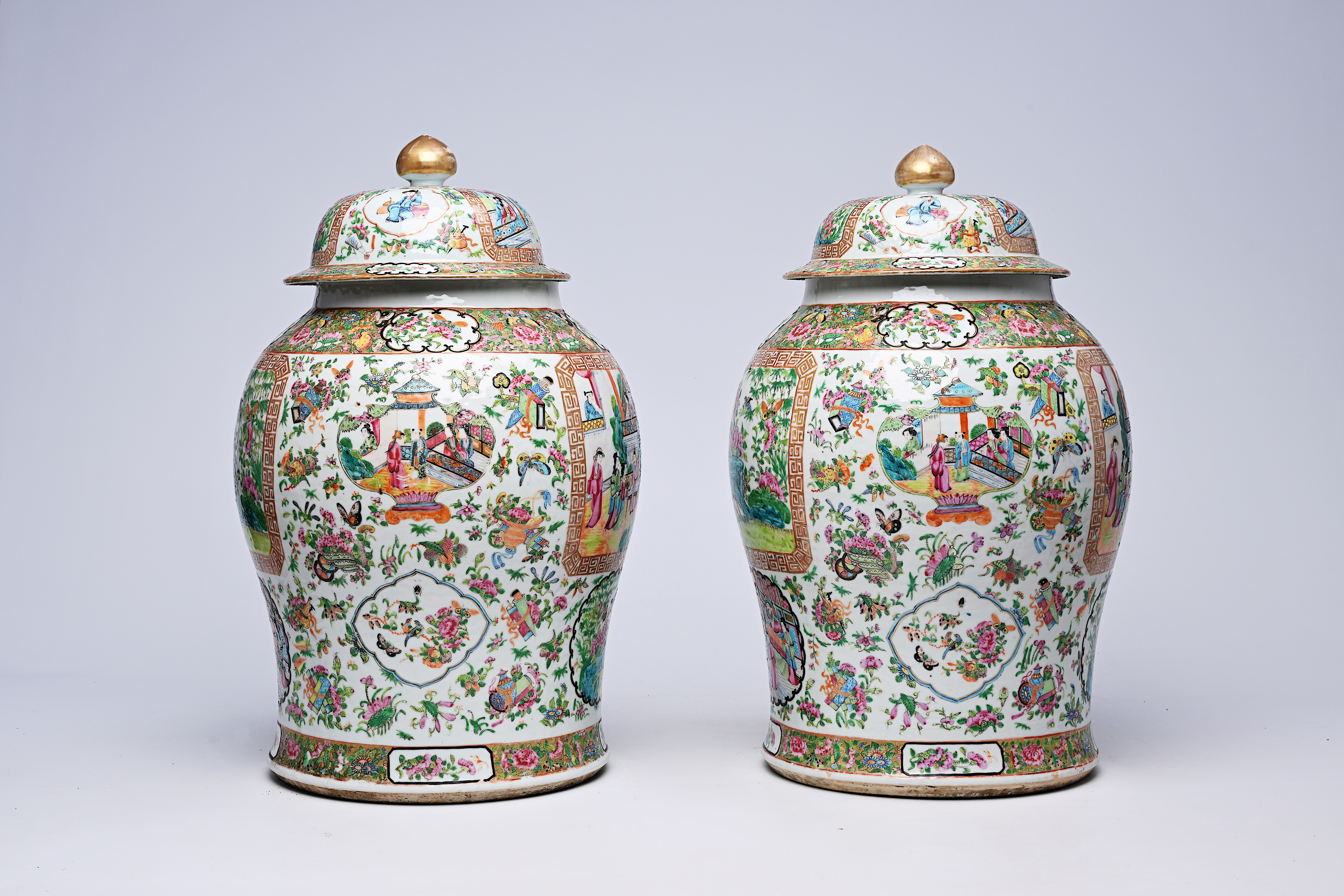 A pair of Chinese Canton famille rose vases and covers with palace scenes and birds and butterflies - Image 3 of 12