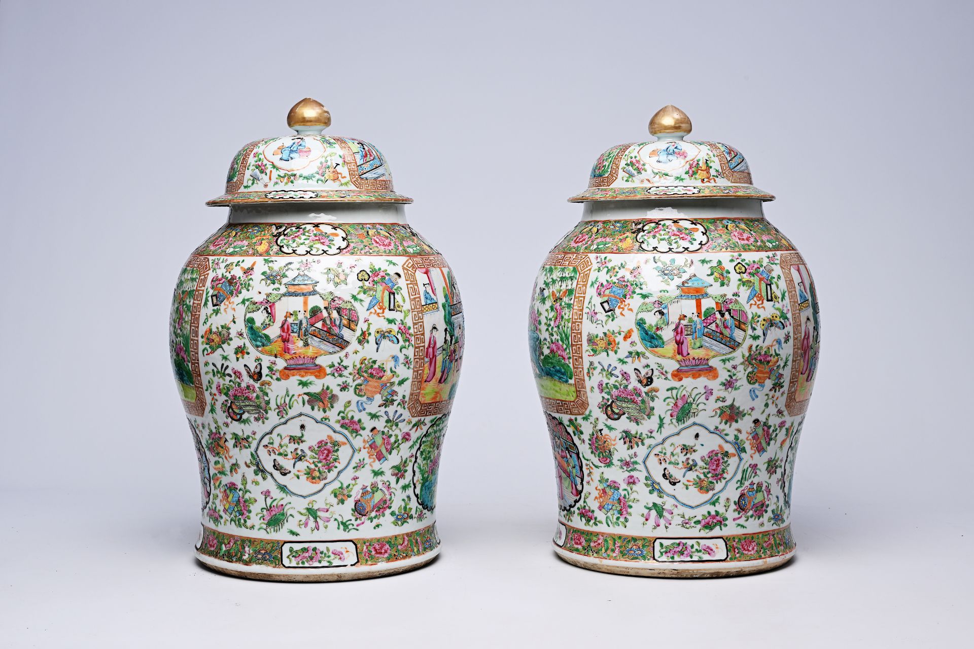 A pair of Chinese Canton famille rose vases and covers with palace scenes and birds and butterflies - Image 3 of 12