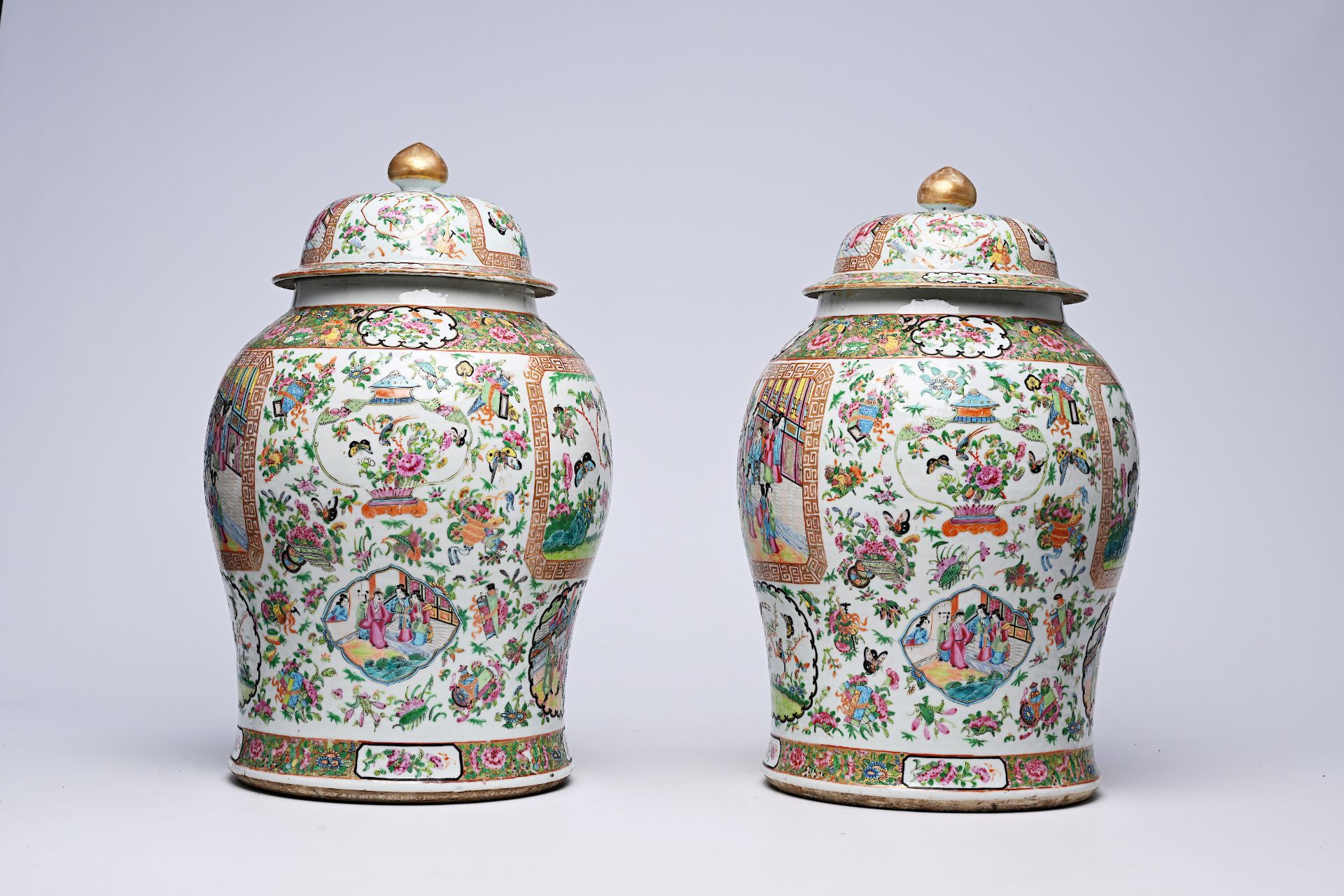 A pair of Chinese Canton famille rose vases and covers with palace scenes and birds and butterflies - Image 4 of 12