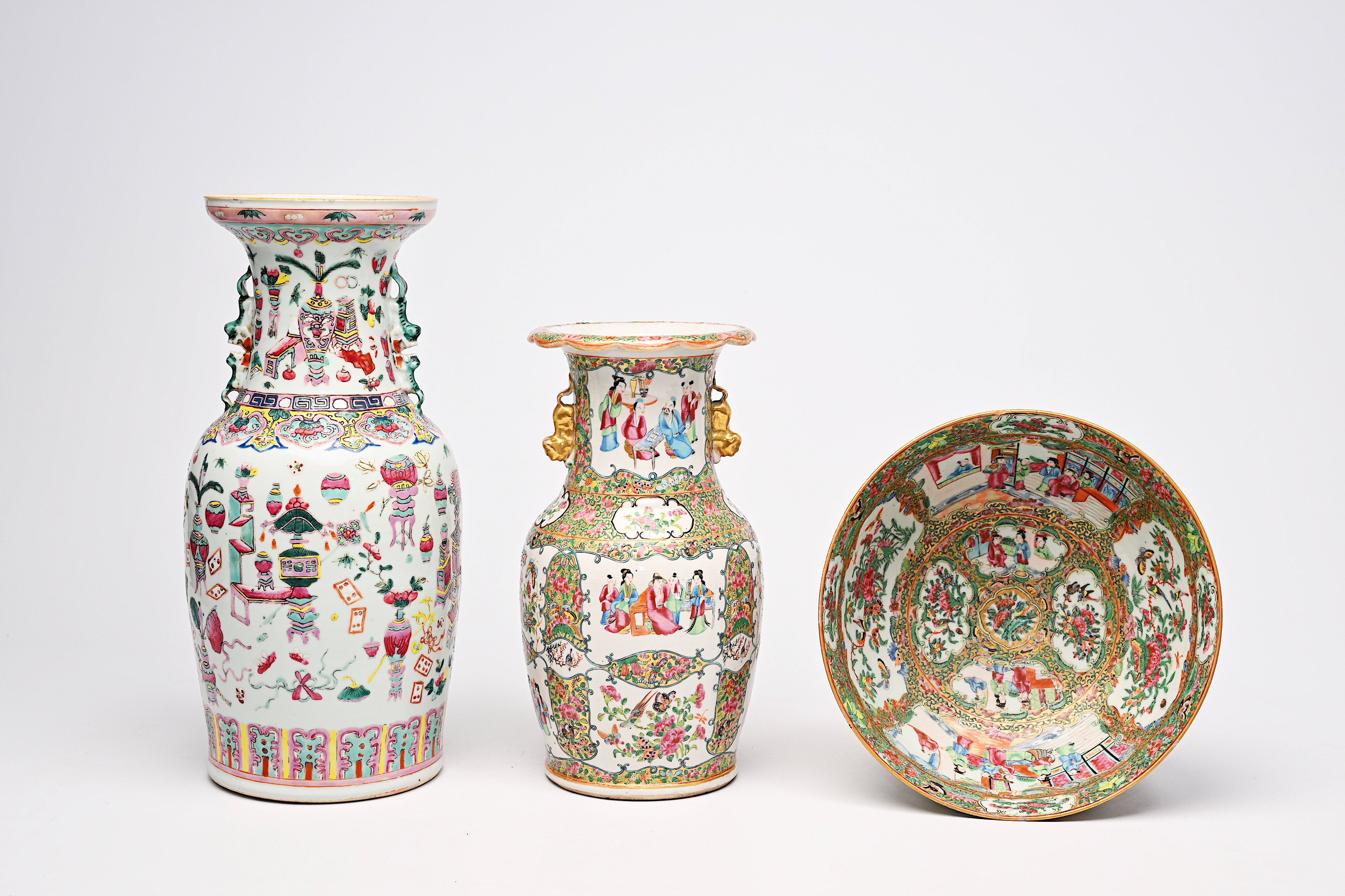A Chinese famille rose 'antiquities' vase and a Canton famille rose vase and bowl, 19th C.