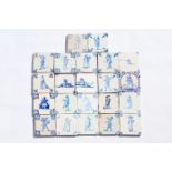 Twenty-two Dutch Delft blue and white 'figure' tiles, 17th/18th C.