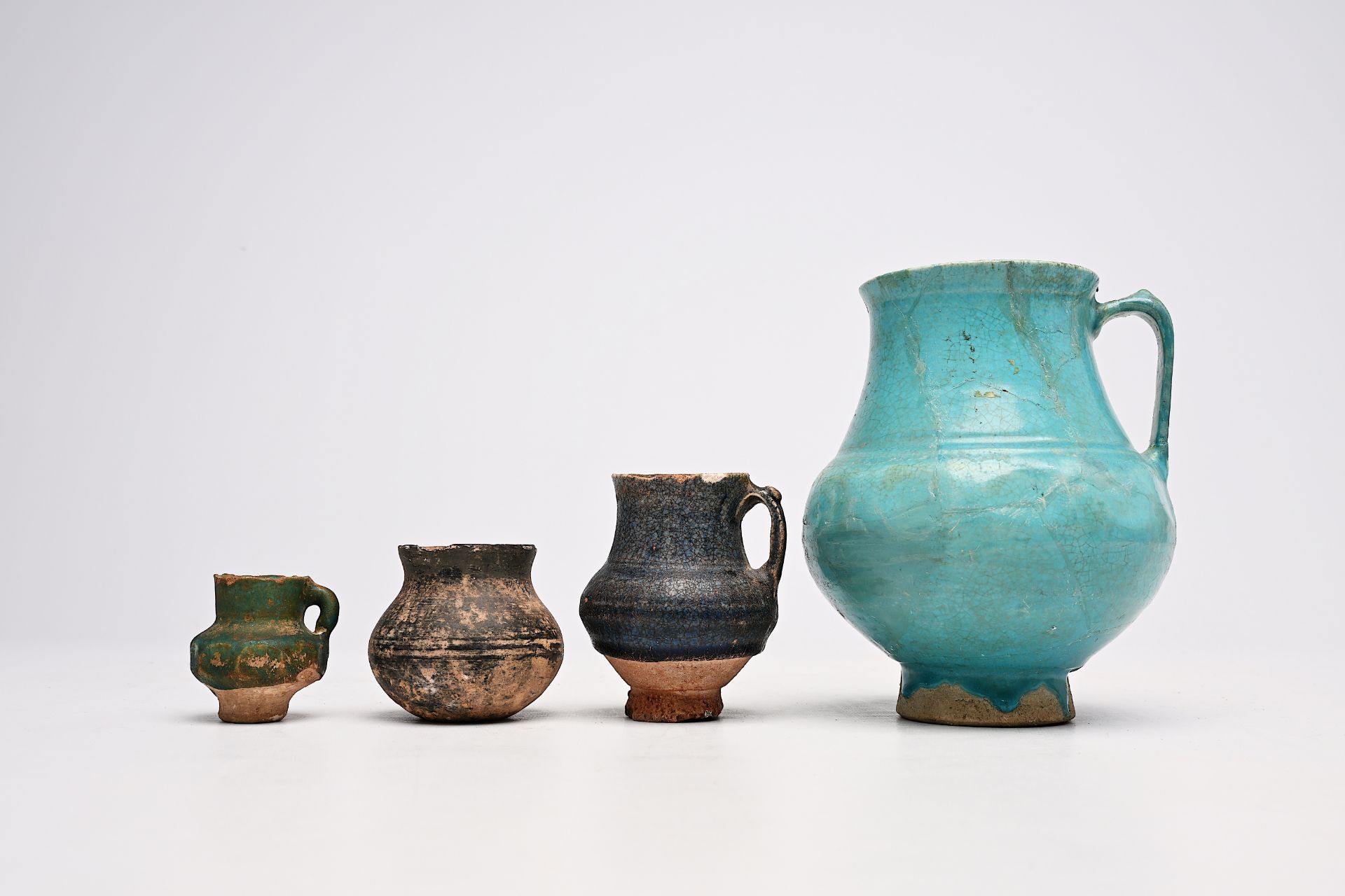 A varied collection of Persian and Hispano-Moresque pottery, 13th C. and later