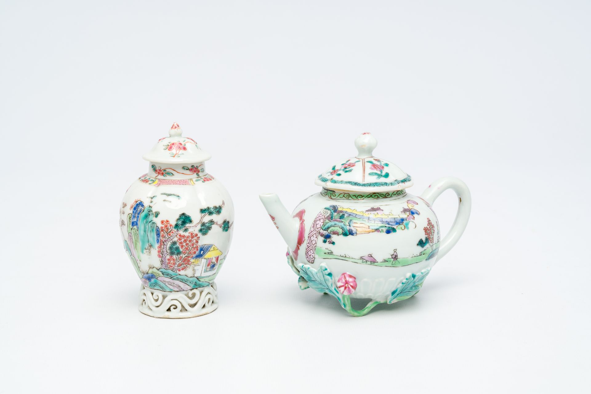 A Chinese famille rose relief-decorated teapot and a tea caddy, Yongzheng/Qianlong