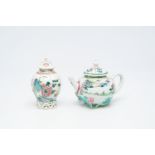 A Chinese famille rose relief-decorated teapot and a tea caddy, Yongzheng/Qianlong