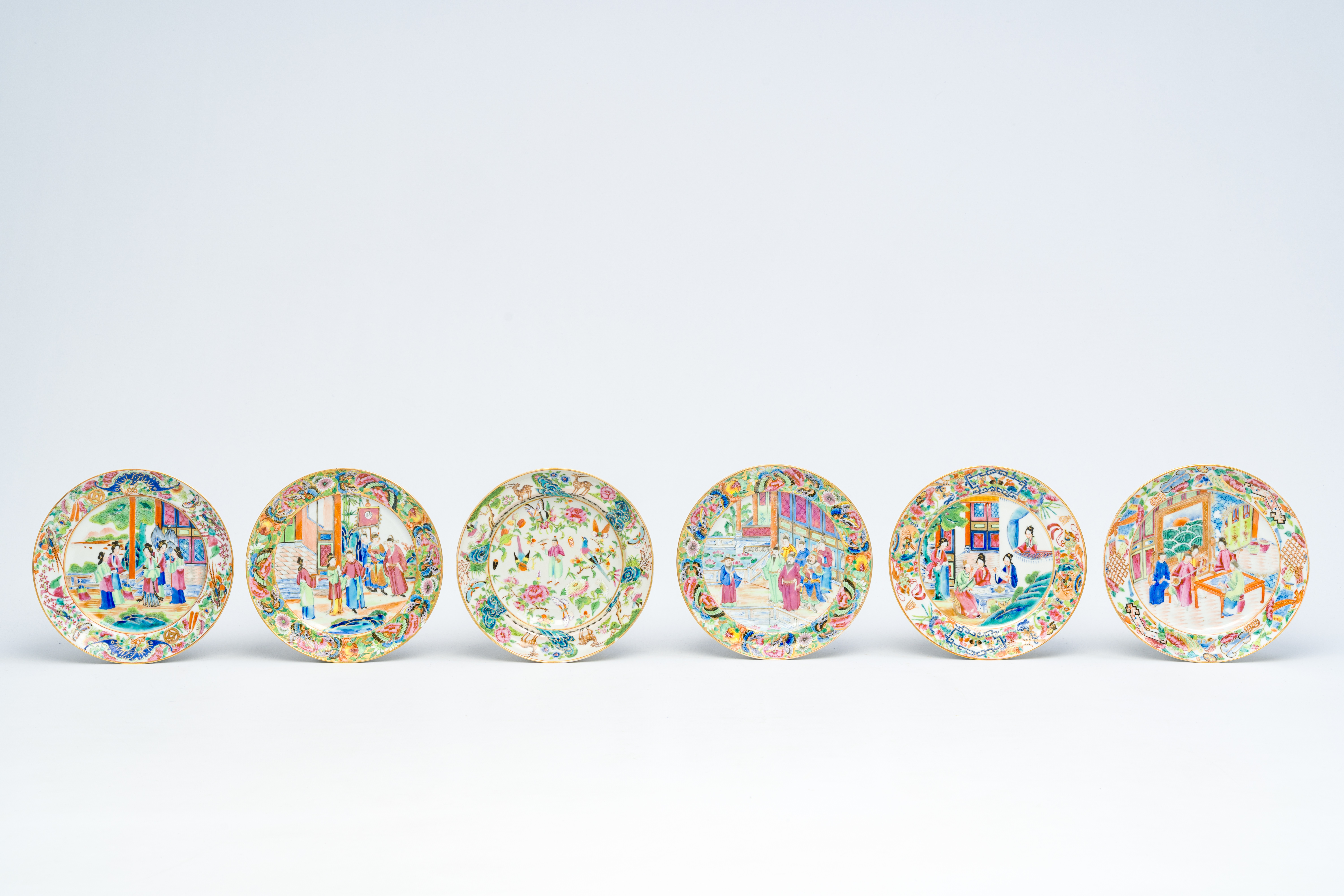 Twelve Chinese Canton famille rose plates with an animated design, 19th C. - Image 4 of 5
