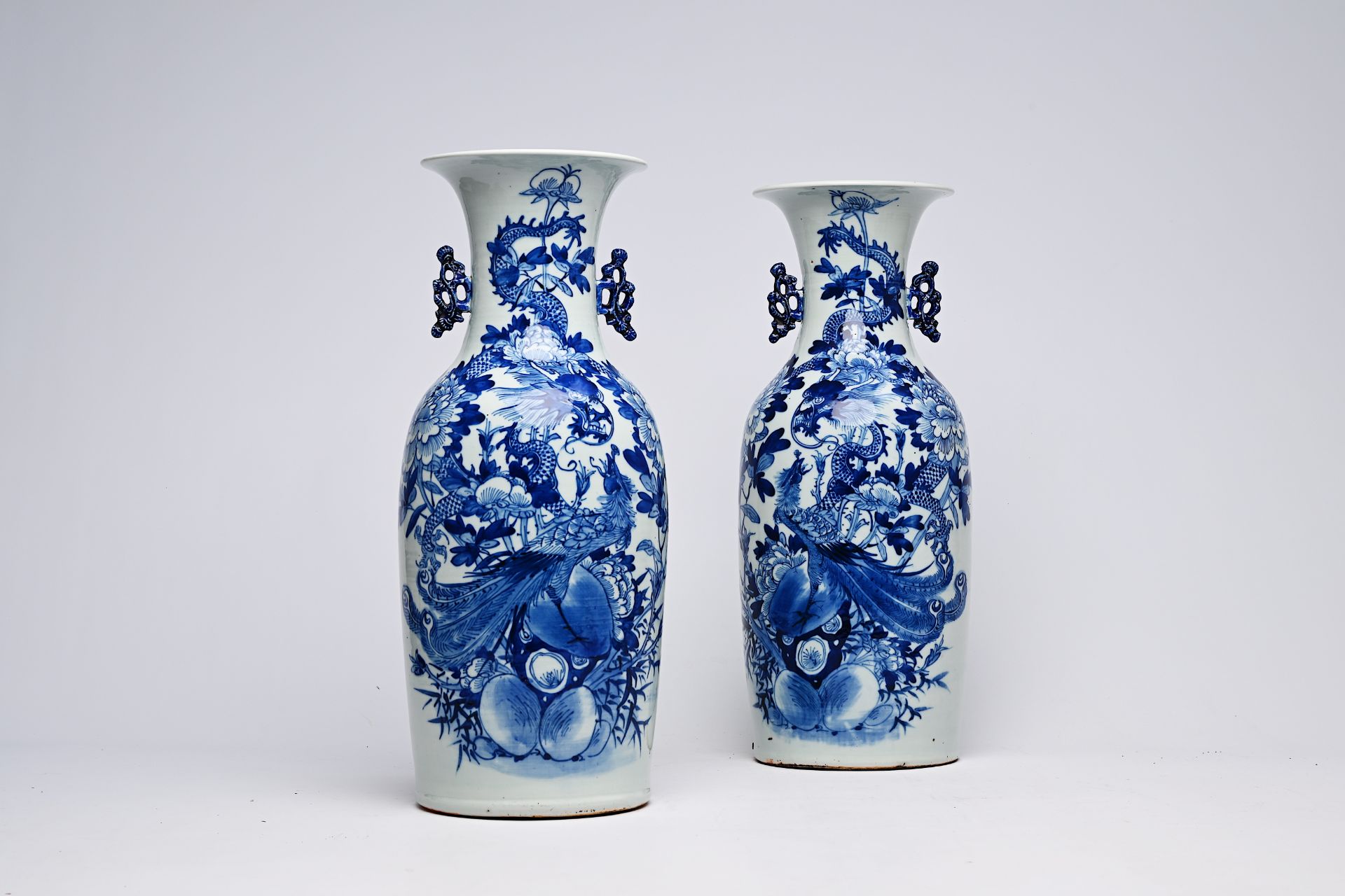 A pair of Chinese blue and white celadon ground vases with a dragon and a phoenix among blossoming b - Bild 19 aus 28