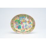 A Chinese Canton famille rose oval 'palace scene' dish, 19th C.