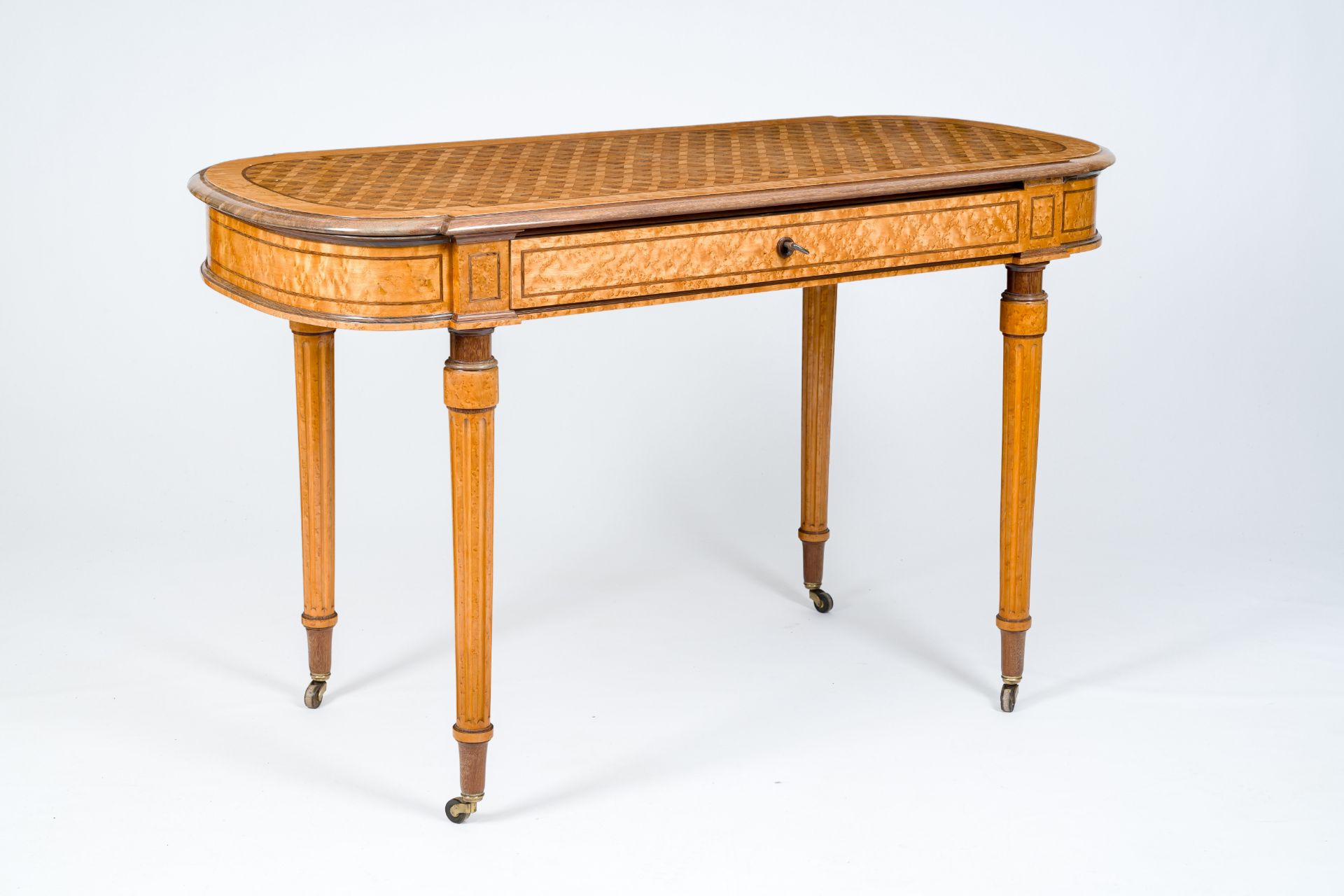 A burl wood veneered parquetry top Biedermeier style table, 19th/20th C.