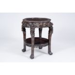 A large Chinese reticulated hardwood stand, 19th C.