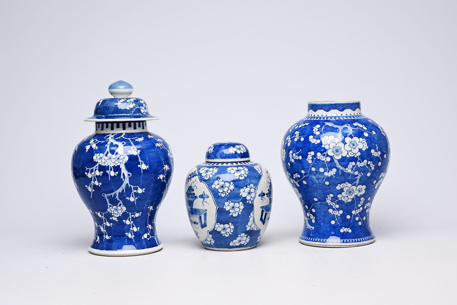 Two Chinese blue and white prunus on cracked ice ground vases and a jar and cover with antiquities, - Image 7 of 16