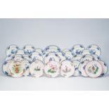 A varied collection of Tournai blue and white plates with floral design and five French faience de l