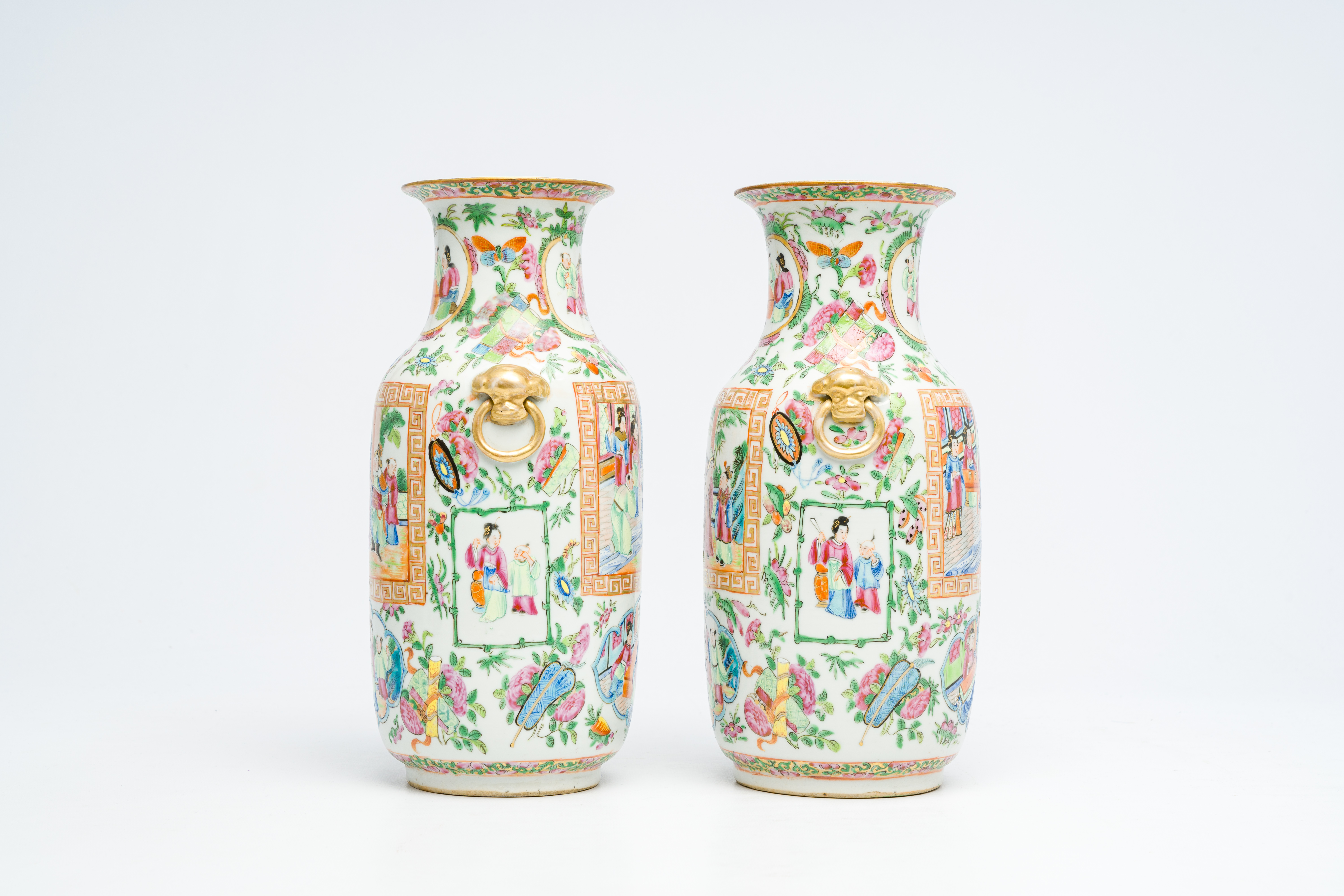 A pair of Chinese Canton famille rose vases with palace scenes and floral design, 19th C. - Image 2 of 6