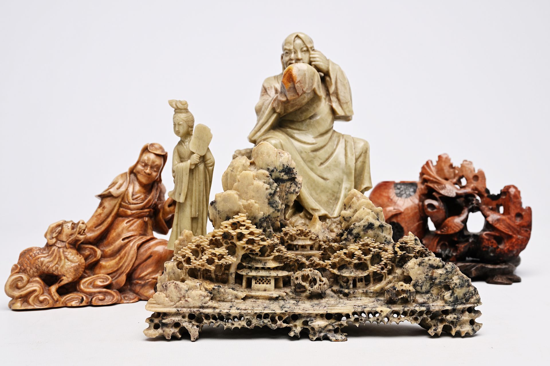 Five Chinese soapstone sculptures, three turquoise glazed lions and a pair of blue and white plates, - Image 9 of 24