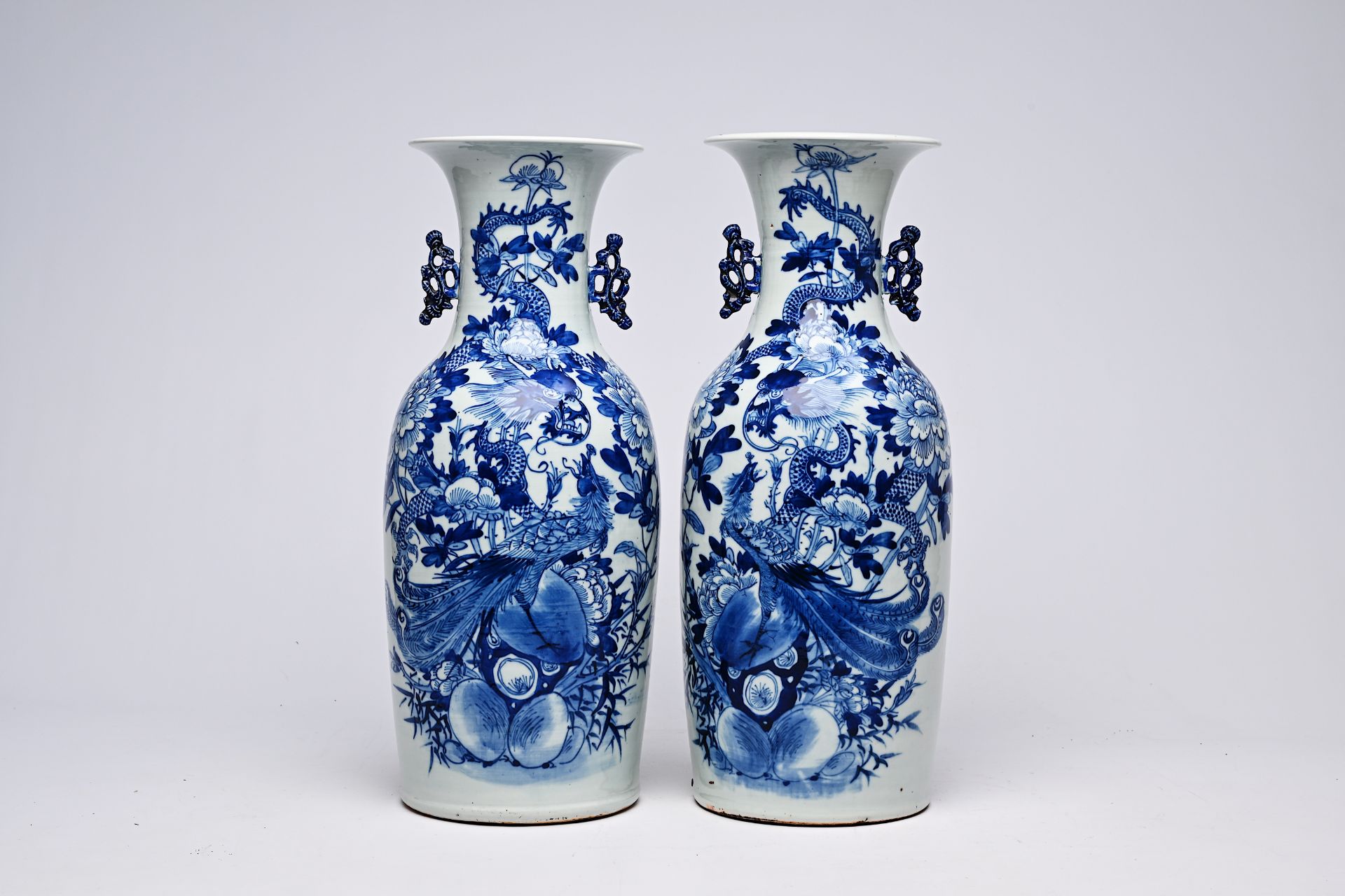 A pair of Chinese blue and white celadon ground vases with a dragon and a phoenix among blossoming b - Bild 2 aus 28