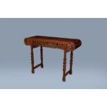 A Chinese carved hardwood 'dragons chasing the pearl' altar table, 20th C.