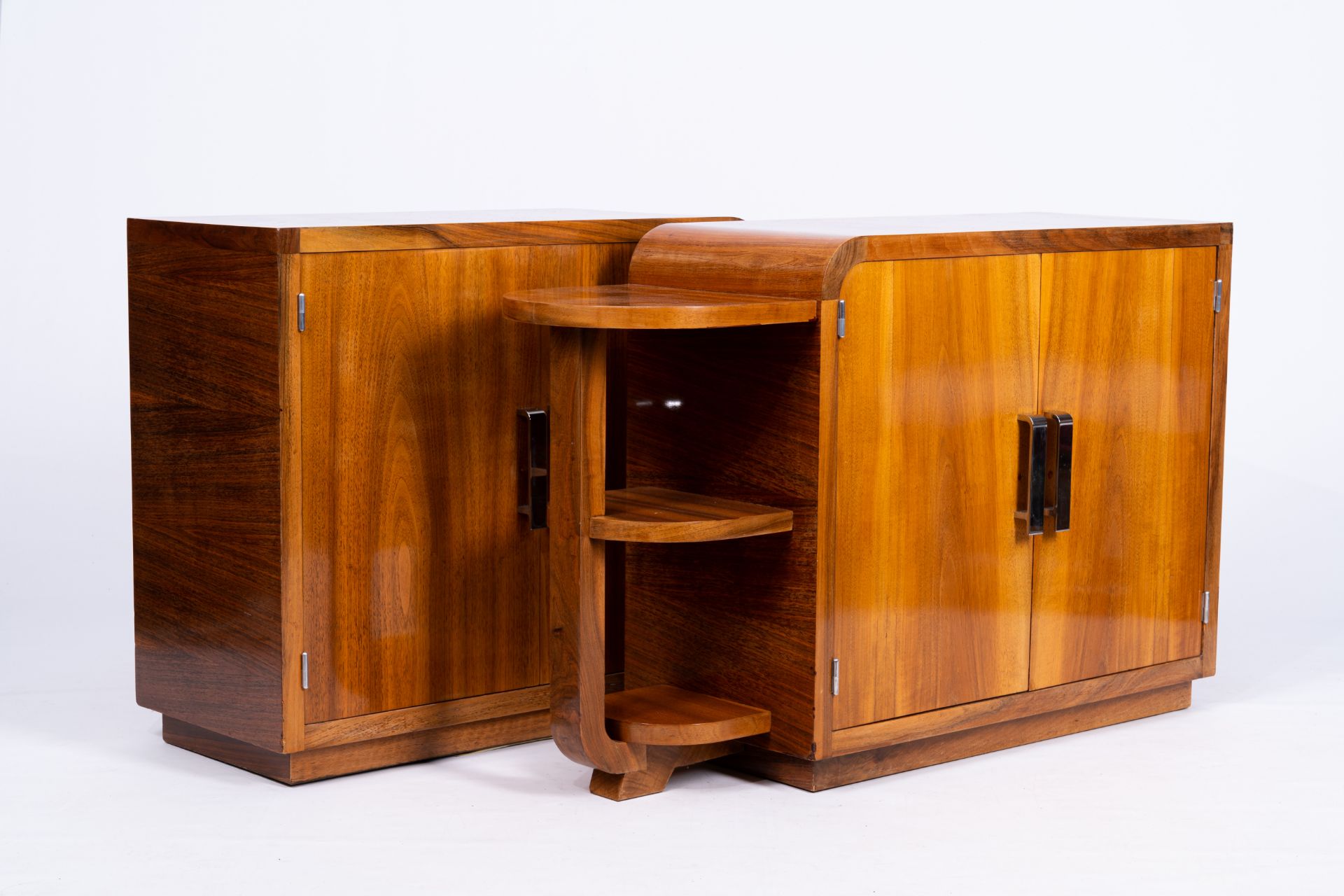 A pair of wood Art Deco two-door cabinets with etagere, first half 20th C.