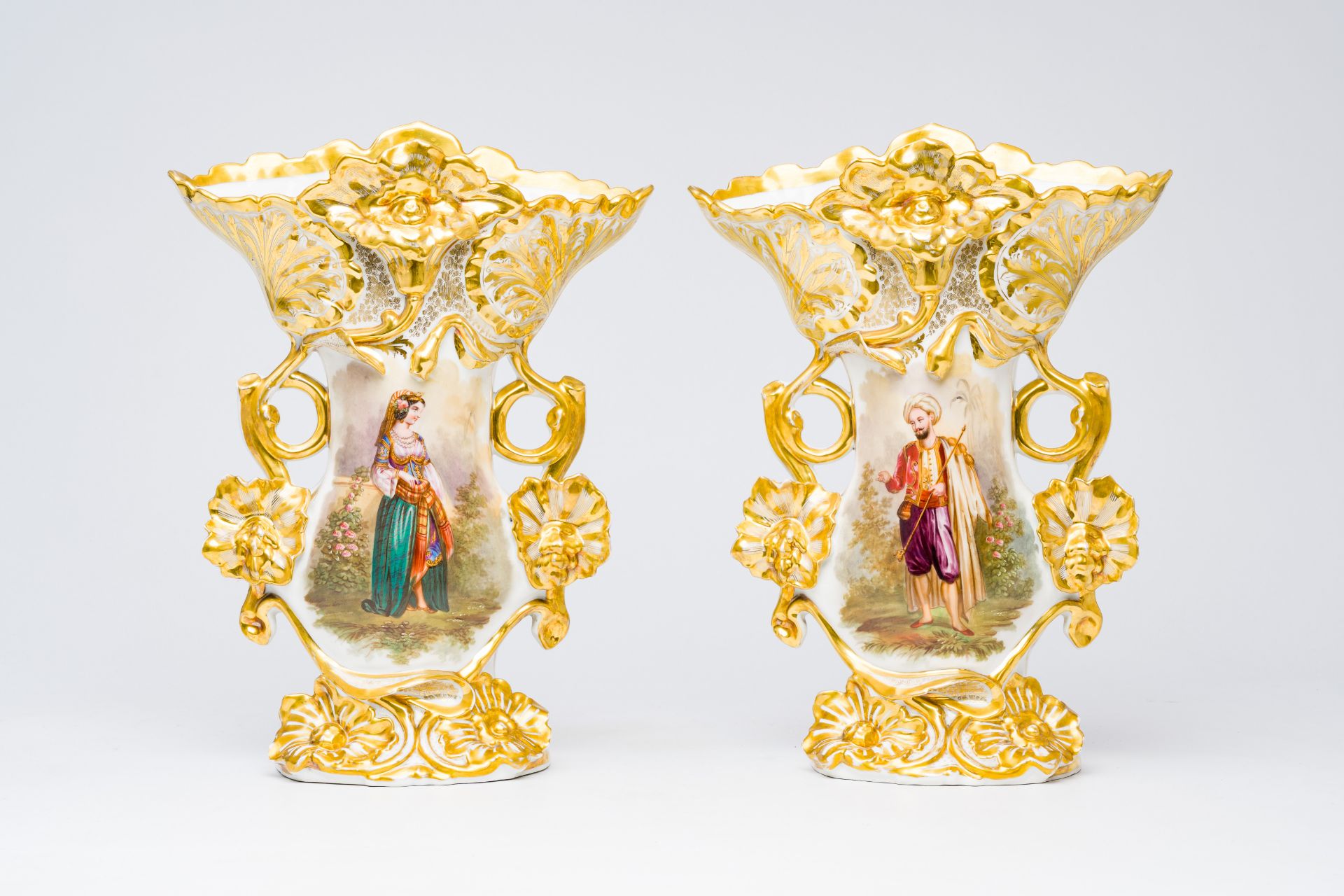 A pair of French gilt and polychrome old Paris porcelain vases with an Indian couple and floral reli - Image 2 of 7