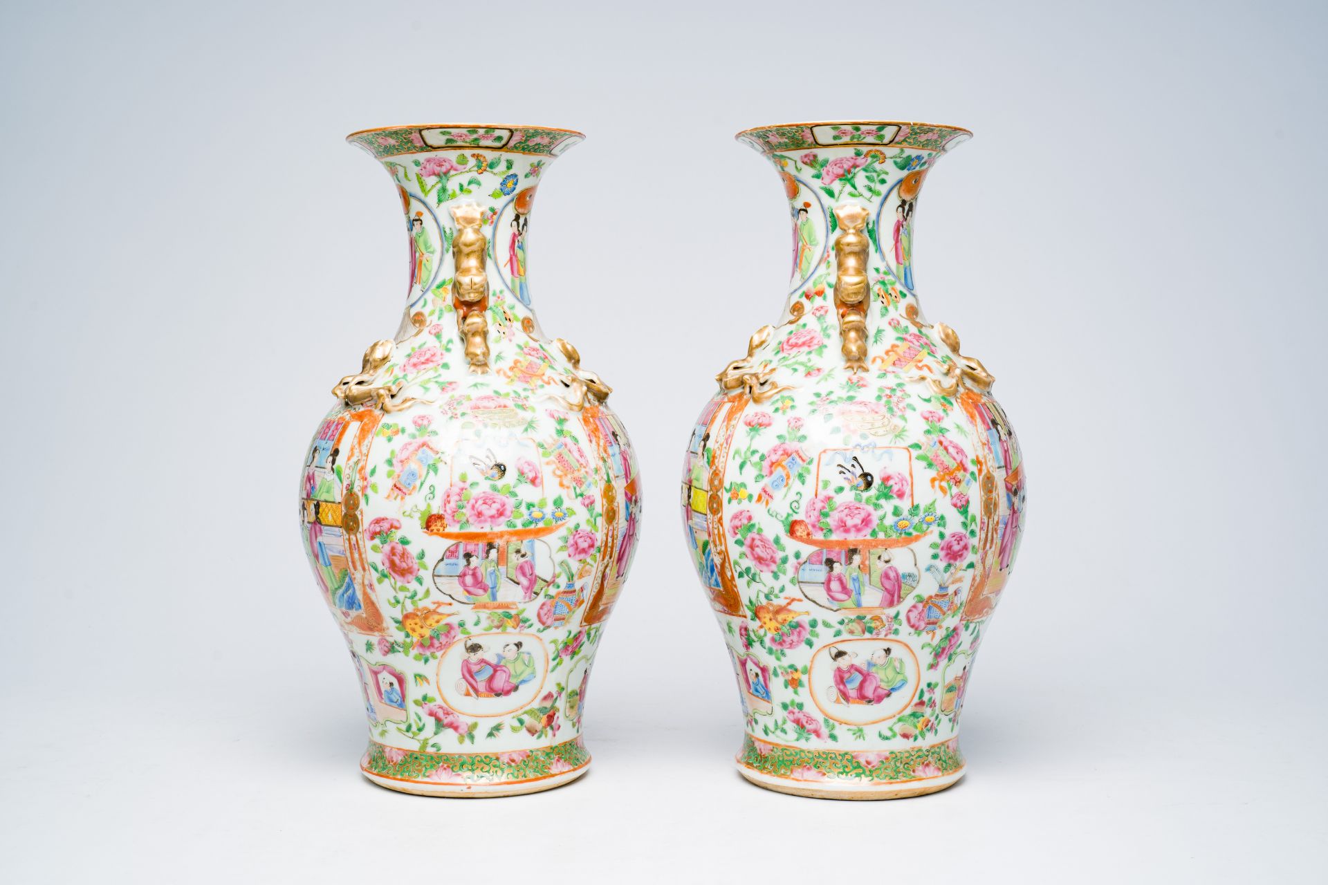 A pair of Chinese Canton famille rose vases with palace scenes, floral design and antiquities, 19th - Image 8 of 28