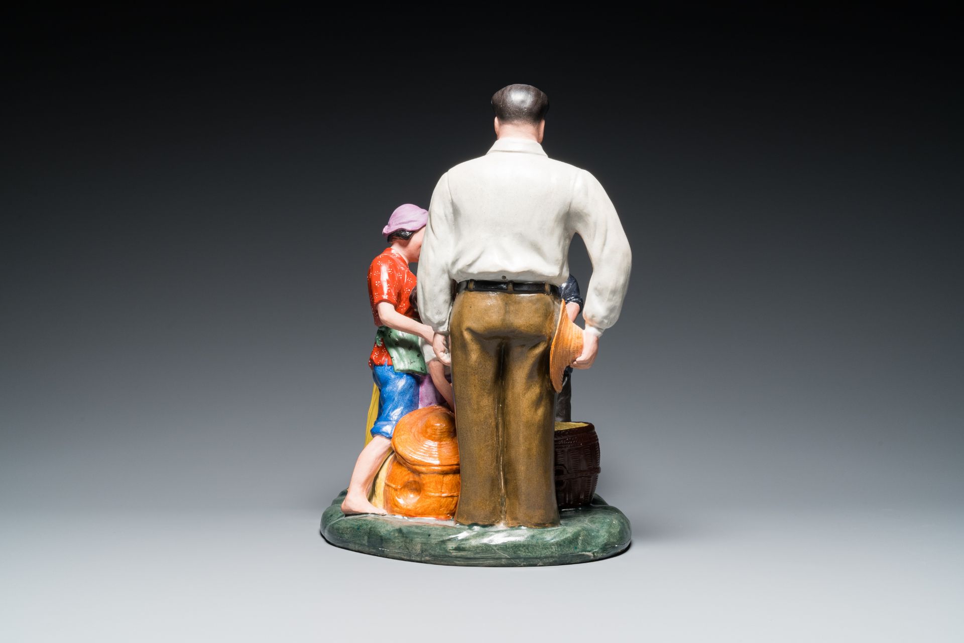 A large Chinese polychrome porcelain Cultural Revolution group with Mao, 20th C. - Image 5 of 7