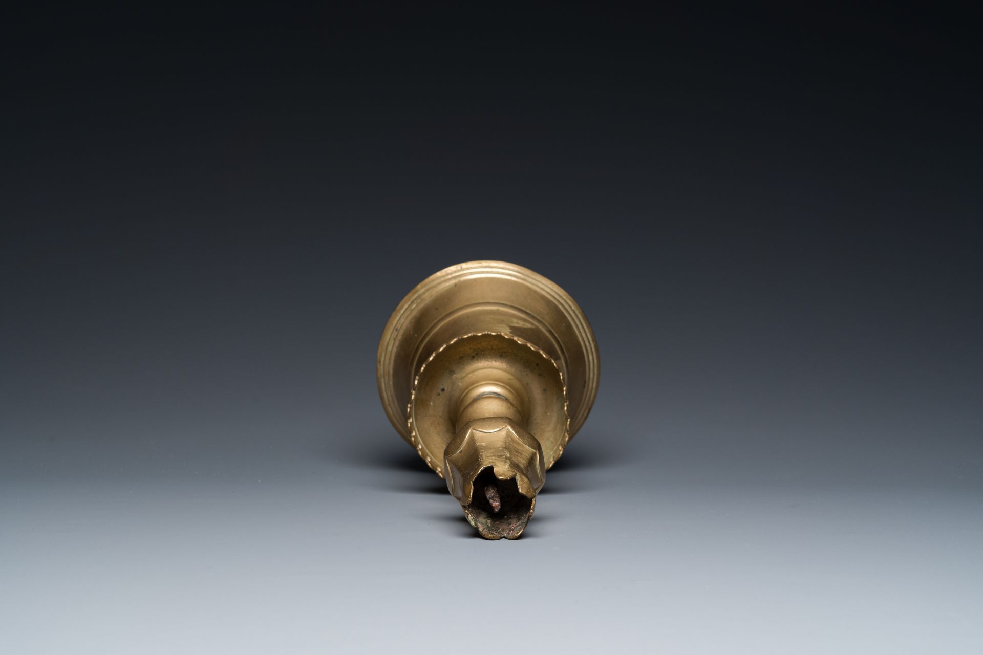 A Turkish bronze candlestick with tulip-shaped sconce, 18th C. - Image 5 of 7