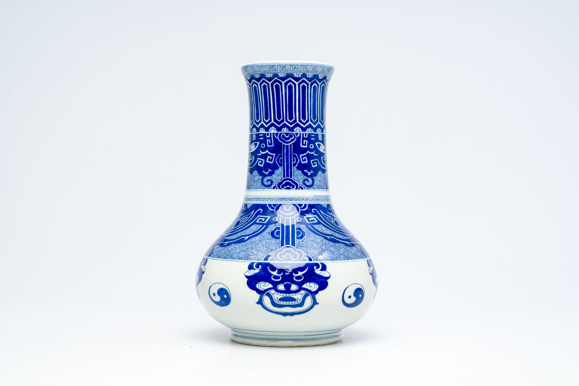 A Chinese peer-shaped blue and white 'taotie masks' vase, 20th C. - Image 2 of 6