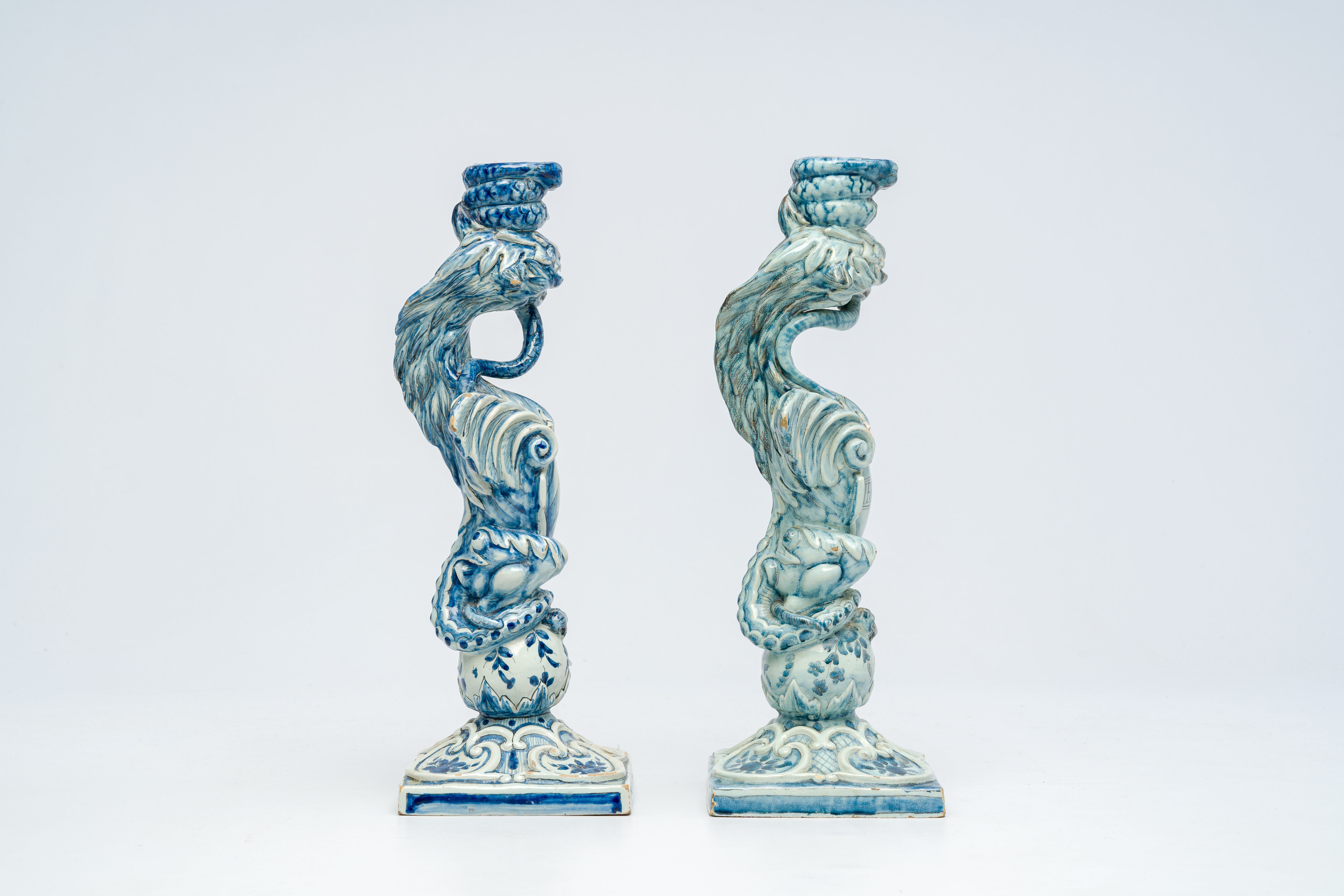 A pair of blue and white Italian pottery 'griffin' candlesticks, Cantagalli, late 19th C. - Image 5 of 7