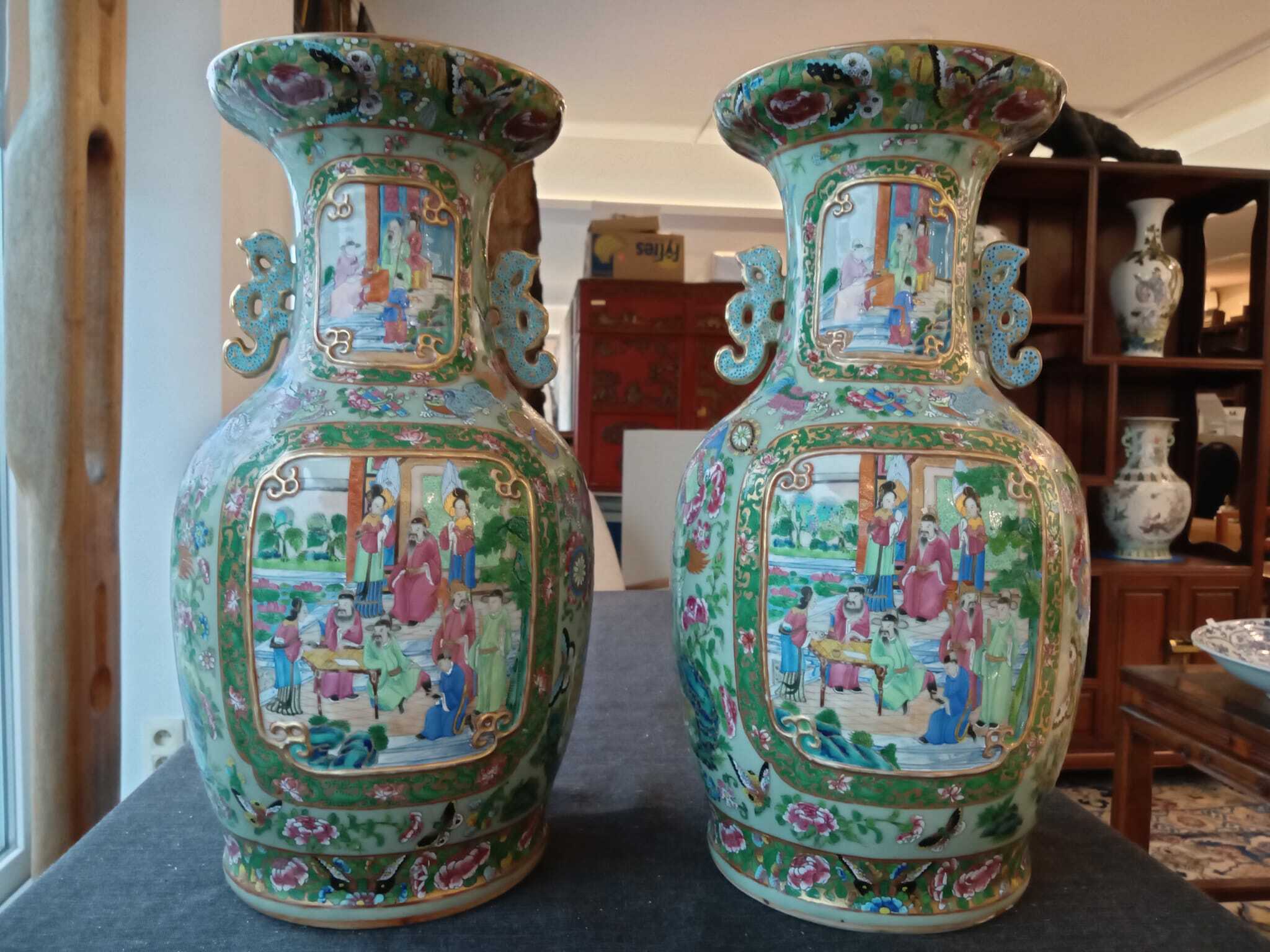 A pair of Chinese Canton famille rose celadon ground vases with palace scenes, animals and antiquiti - Image 13 of 64