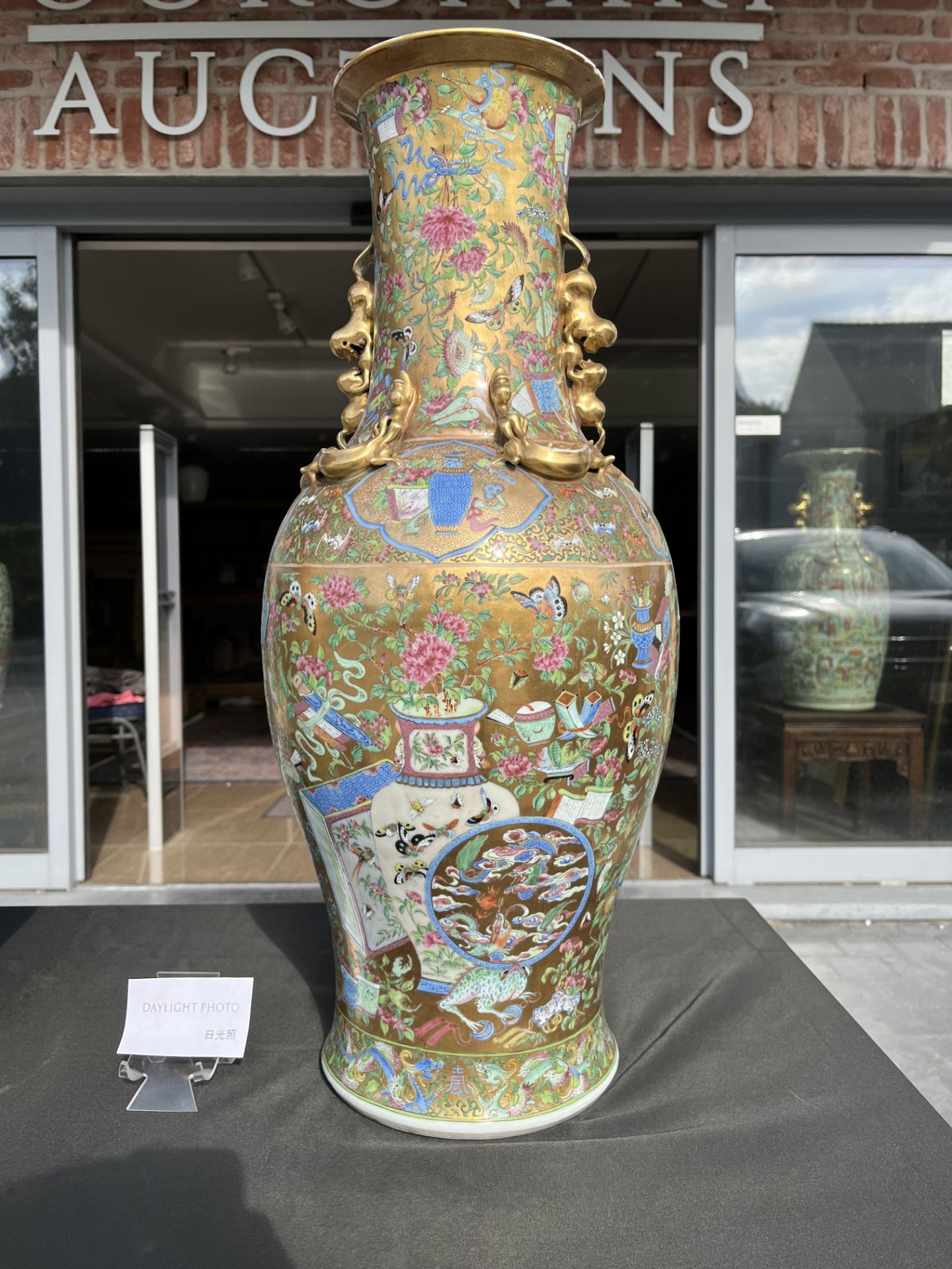 A pair of Chinese Canton famille rose gold ground vases with birds and butterflies among blossoming - Image 33 of 60