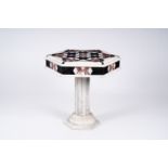 An Italian hexagonal marble side table with geometric design, 20th C.