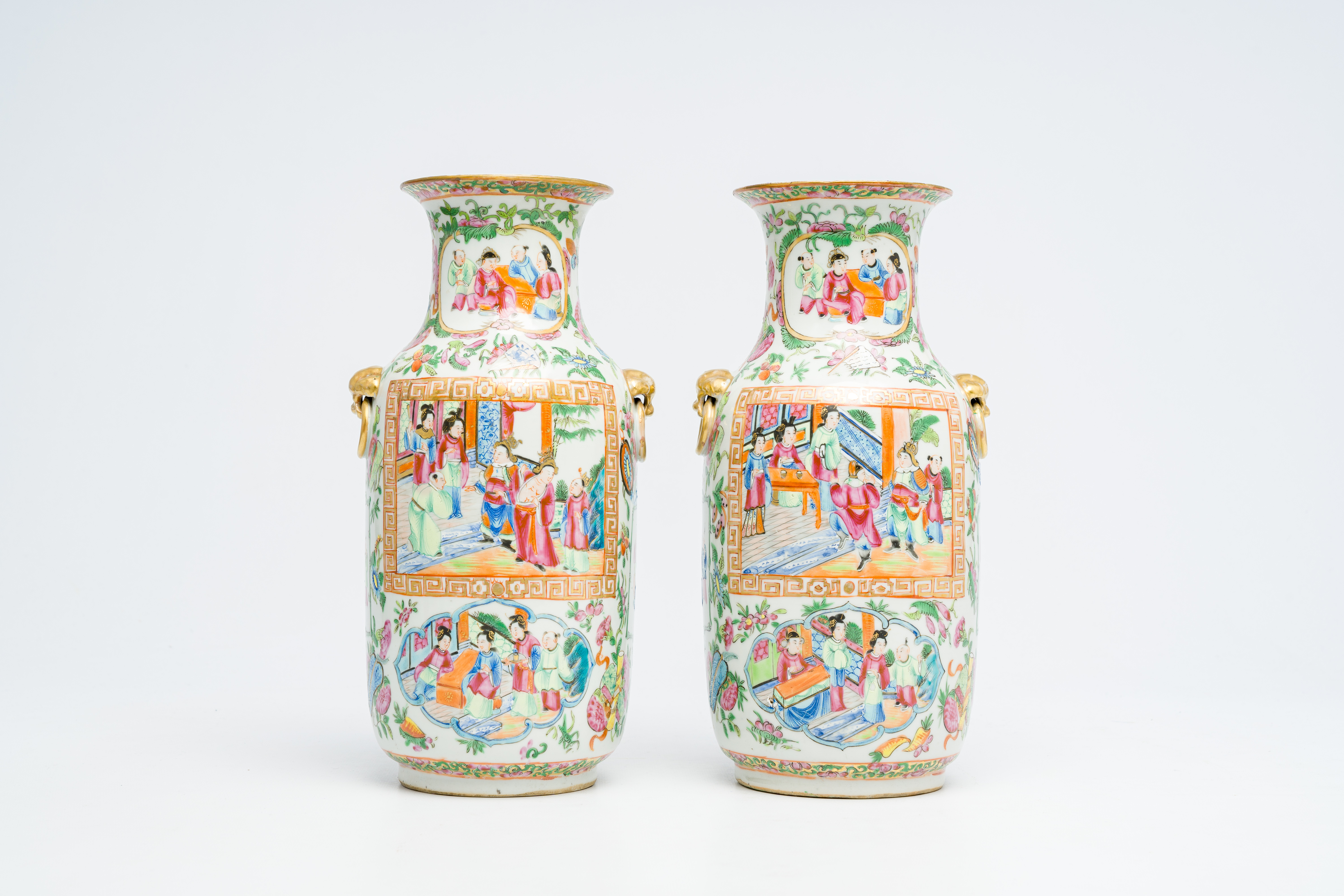 A pair of Chinese Canton famille rose vases with palace scenes and floral design, 19th C. - Image 3 of 6